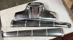 1946 - 48 Ford Super Deluxe Upper Grille & Hood Emblem With Sides. Fixed Price $150.00.