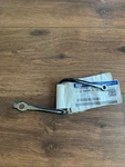 Genuine Ford Hood Latch Striker Plate HC3Z-16K689-A. Fixed Price $45.99.