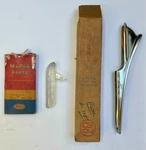New Old Stock Hood Ornament Assy For 1946-48 Plymouth P15 #1149741 & #1065766. Fixed Price $825.00.
