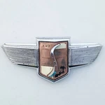 Vintage 1947-48 Studebaker Hood Grill Emblem Commander Ornament #7724. Fixed Price $80.00.