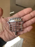 1974 1975 1976 Cadillac Deville D'elegance Skeleton Hood Ornament Crest Emblem. Fixed Price $65.00.