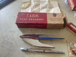 Nos 1959-1961 Studebaker Lark Hood Ornament AC-3073. Fixed Price $155.00.