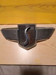 Hood Emblem, 1947-48-49 Studebaker Commander Champion. Fixed Price $60.00.